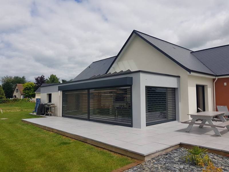 Pose de volets roulants électriques transparents proche Rouen